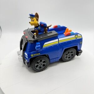 2013 Paw Patrol Chase's Cruiser with On-A-Roll Chase Figure Transforms Rolls